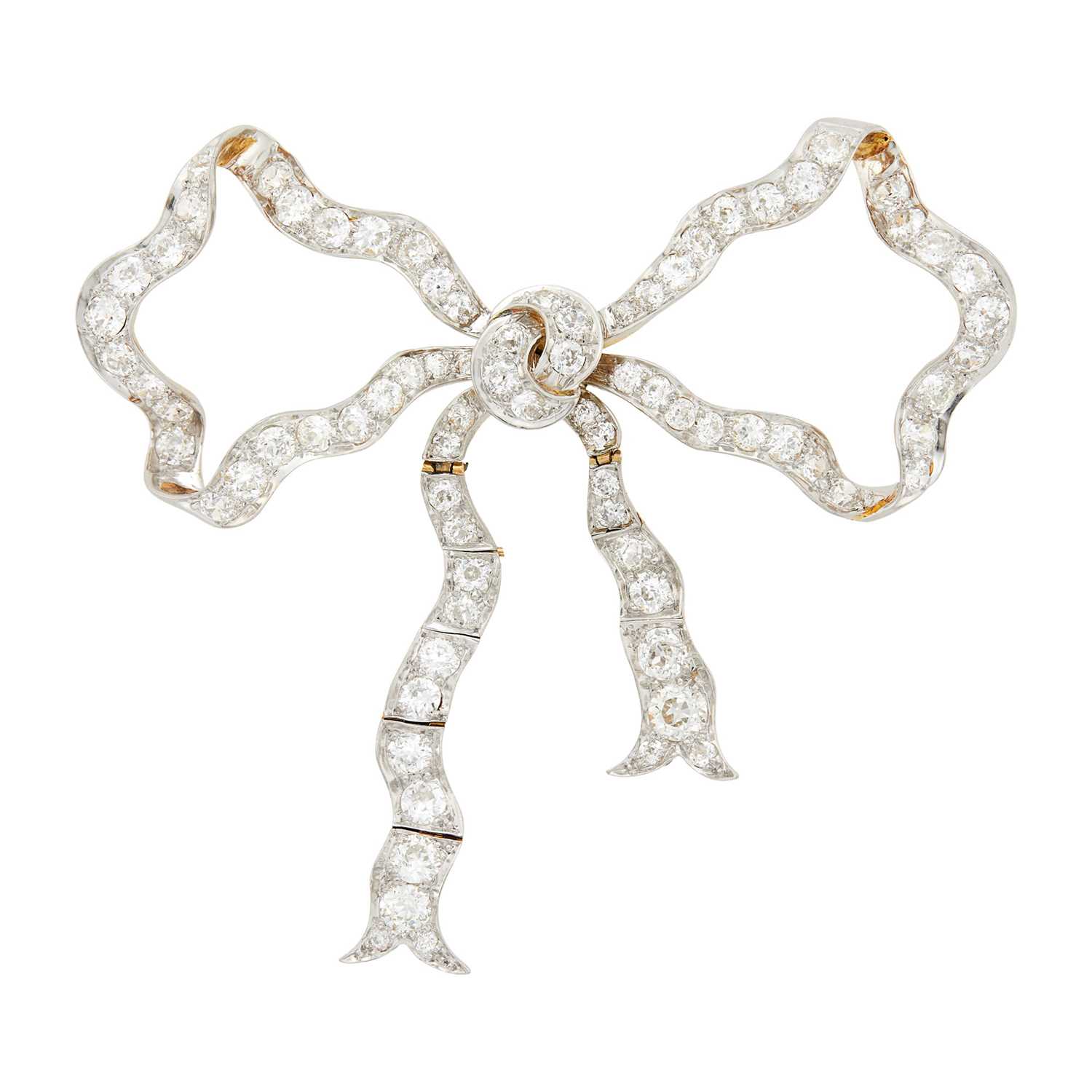 Lot 185 - E.M. Gattle & Co. Belle Époque Platinum, Gold and Diamond Bow Brooch