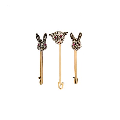 Lot 2200 - Three Silver, Gold, Diamond, Ruby and Enamel Rabbit and Wolf Safety Pins