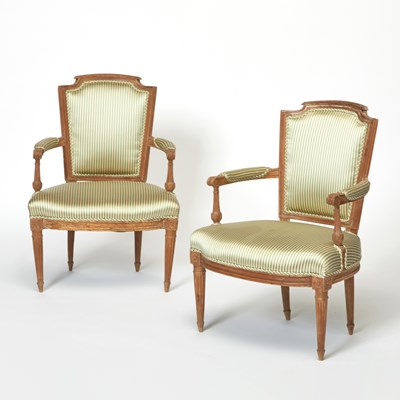 Lot 405 - Pair of Louis XVI Upholstered Walnut Fauteuils