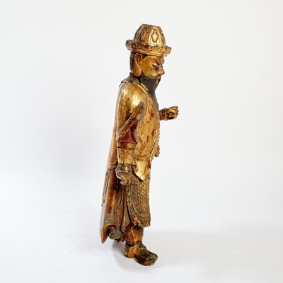 Lot 145 - A Large Chinese Gilt Lacquered Wood Figure of a Guardian