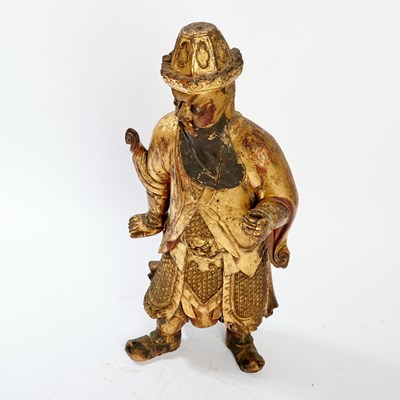 Lot 145 - A Large Chinese Gilt Lacquered Wood Figure of a Guardian