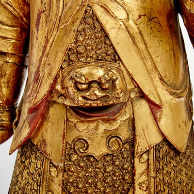 Lot 145 - A Large Chinese Gilt Lacquered Wood Figure of a Guardian