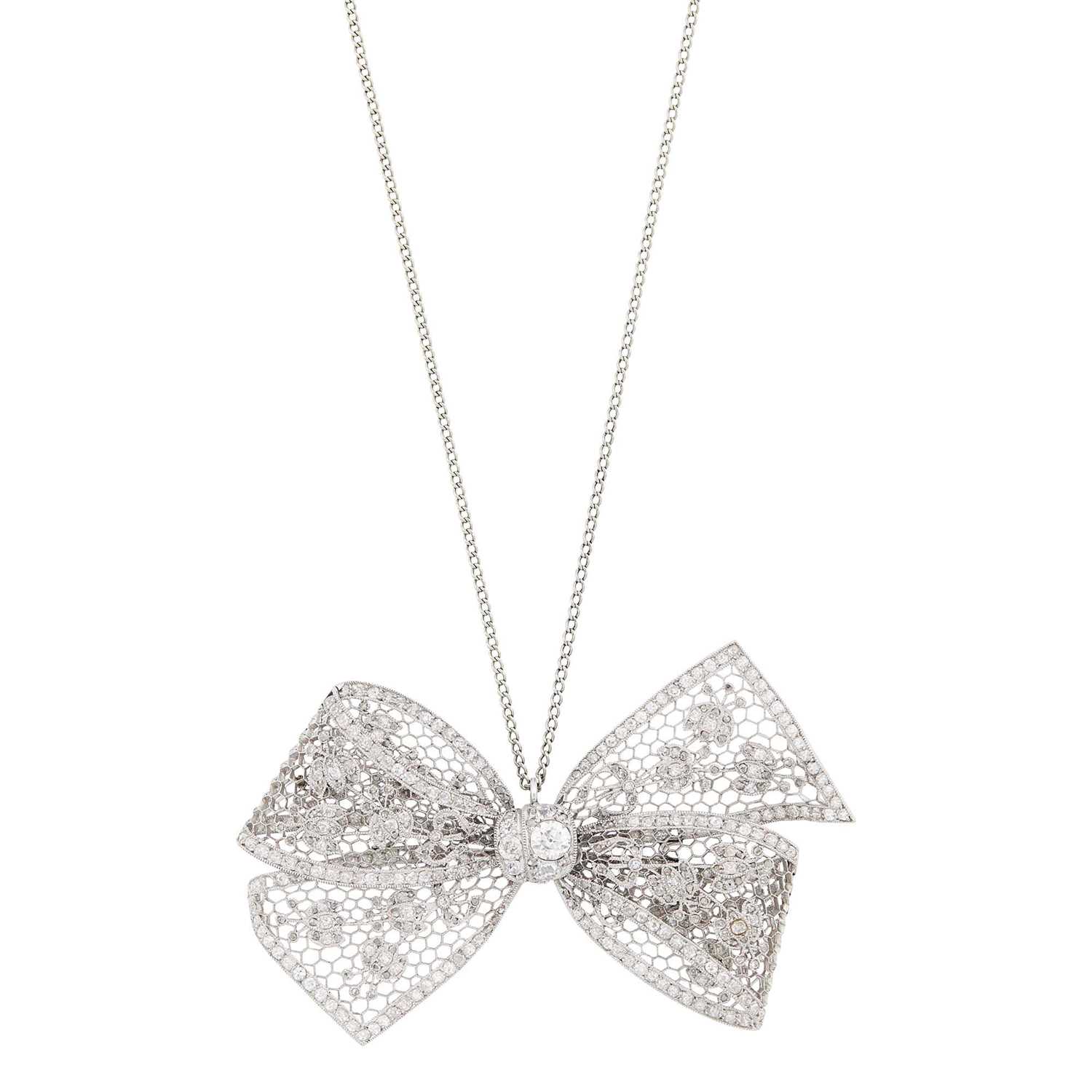 Lot 96 - Edwardian Platinum and Diamond Bow Pendant with White Gold Chain Necklace