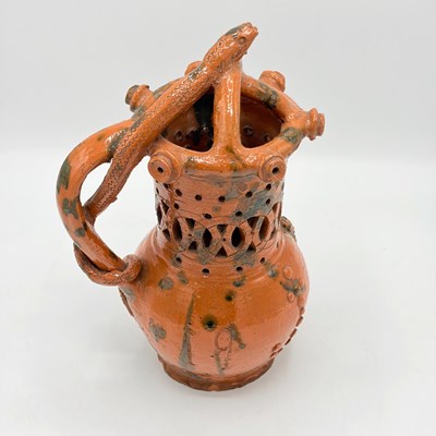 Lot 1137 - Glazed Redware Puzzle Jug