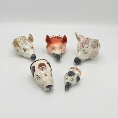 Lot 1139 - Group of Five Staffordshire Fox or Hound Form Stirrup Cups