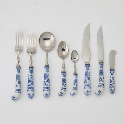 Lot 778 - Porcelain and Silver Plated Blue Onion Pattern Flatware Service