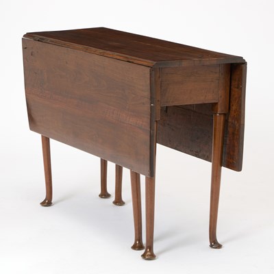 Lot 135 - Queen Anne Walnut Six-Legged Drop-Leaf Dining Table