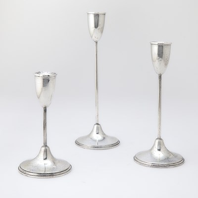 Lot 221 - Graduated Set of Three American Sterling Silver Candlesticks