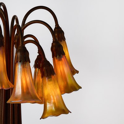 Lot 259 - Tiffany Studios Bronze and Favrile Glass Twelve-Light Pond Lily Lamp