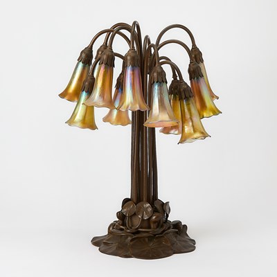 Lot 259 - Tiffany Studios Bronze and Favrile Glass Twelve-Light Pond Lily Lamp
