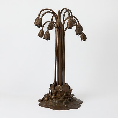 Lot 259 - Tiffany Studios Bronze and Favrile Glass Twelve-Light Pond Lily Lamp