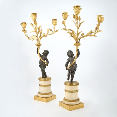 Lot 502 - Pair of Louis XVI Style Gilt and Patinated Bronze Mounted White Marble Three-Light Candelabra