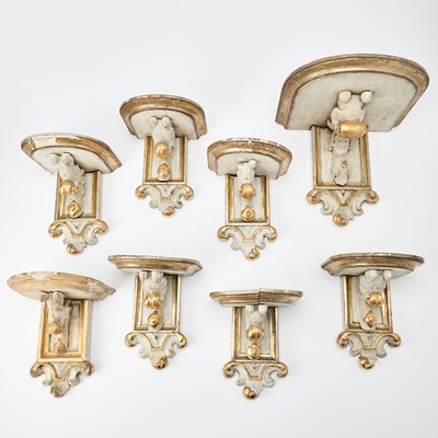 Lot 154 - Group of Eight Baroque Style White Painted and Gilt Brackets