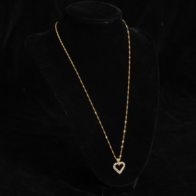 Lot 333 - 14kt Gold and Diamond Heart Necklace