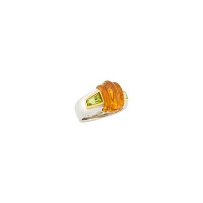 Lot 69 - Bulgari Two-Color Gold, Carved Citrine and Peridot Ring
