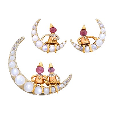 Lot 103 - J. E. Caldwell & Co. Tricolor Gold, Moonstone and Ruby Bead Brooch and Pair of Earclips