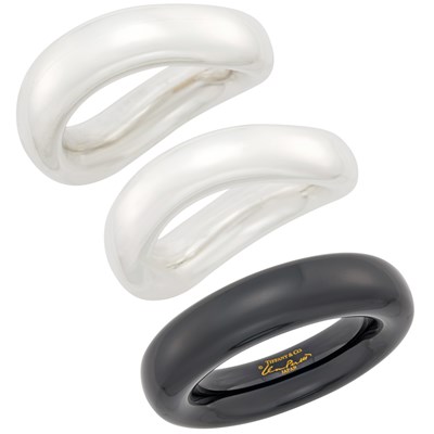Lot 1053 - Angela Cummings Pair of Silver Bangle Bracelets and Tiffany & Co., Elsa Peretti Black Lacquer 'Doughnut' Bangle Bracelet