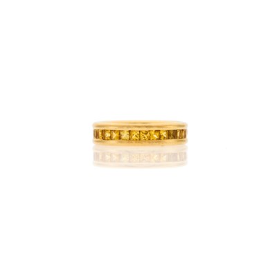 Lot 2221 - Bulgari Gold and Yellow Sapphire Band Ring