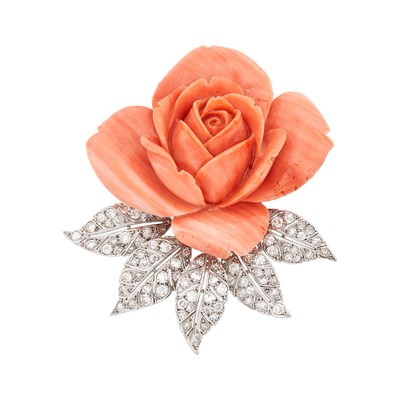 Lot 1195 - Platinum, Carved Angel Skin Coral and Diamond Rose Clip-Brooch