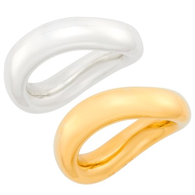 Lot 1044 - Angela Cummings Two Gold and Sterling Silver Bangle Bracelets