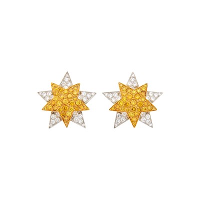 Lot 186 - Oscar Heyman & Brothers Pair of Platinum, Gold, Colored Diamond and Diamond Star Earrings