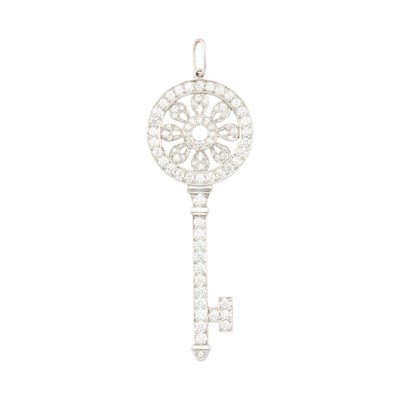 Lot 1088 - Tiffany & Co. Platinum and Diamond 'Petals' Key Pendant