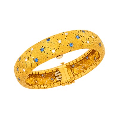 Lot 1146 - Tiffany & Co. Gold, Diamond and Sapphire Bracelet-Watch