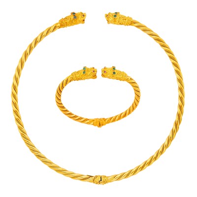Lot 1029 - Gold and Gem-Set Chimera Torque Necklace and Bangle Bracelet