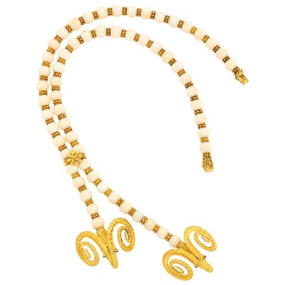 Lot 85 - Gold and White Coral Bead Double Ram's Head Pendant-Necklace