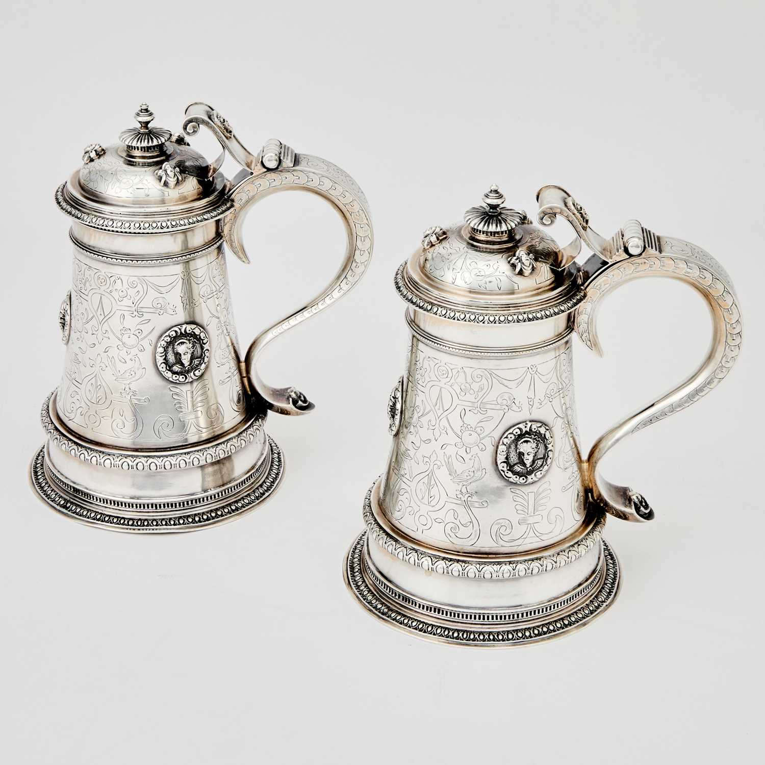 Lot 123 - Pair of Edward VII Sterling Silver Covered Tankards