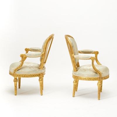 Lot 312 - Set of Six Louis XVI Carved Giltwood Fauteuils en Cabriolet