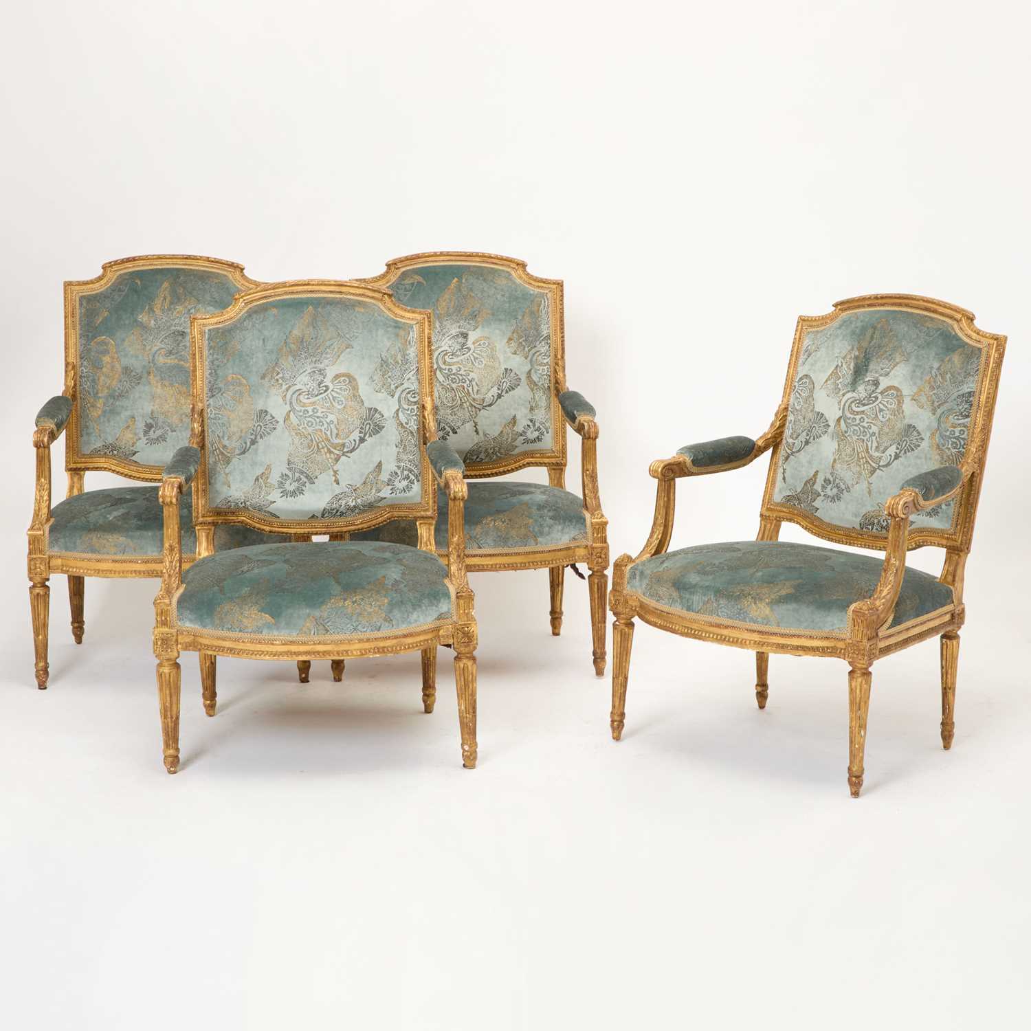 Lot 321 - Set of Four Louis XVI Carved Giltwood Fauteuils à la Reine