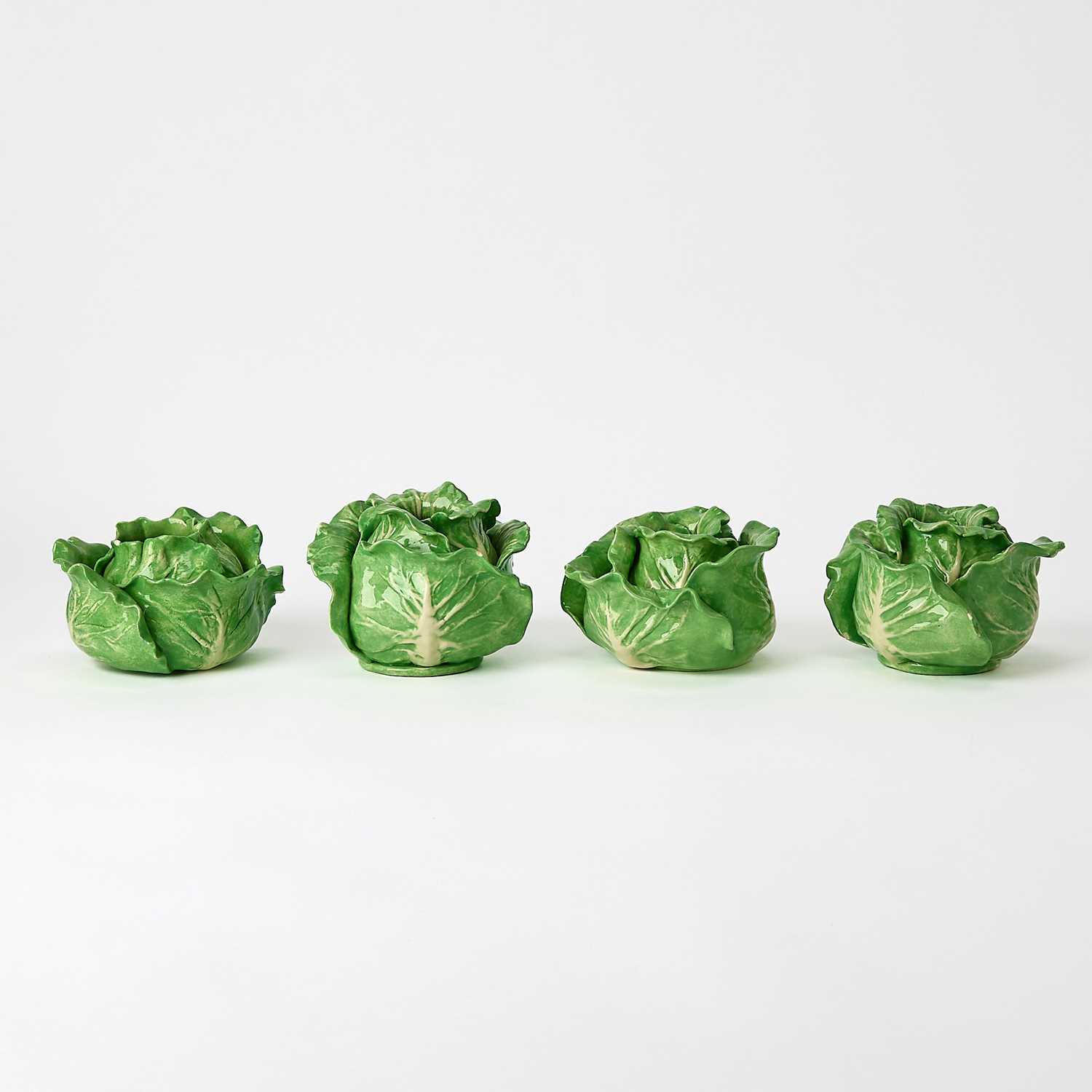 Lot 616 - Four Dodie Thayer Votives