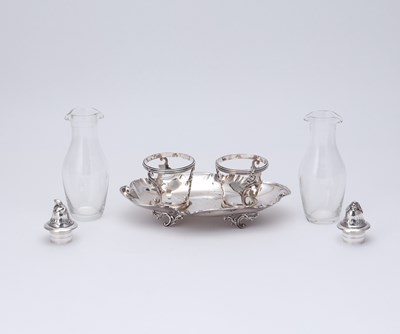 Lot 155 - French Louis XV Style Silver and Glass Cruet Set