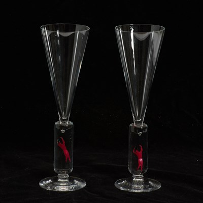 Lot 323 - Pair of Kosta Boda Bertil Vallien Champagne Glasses