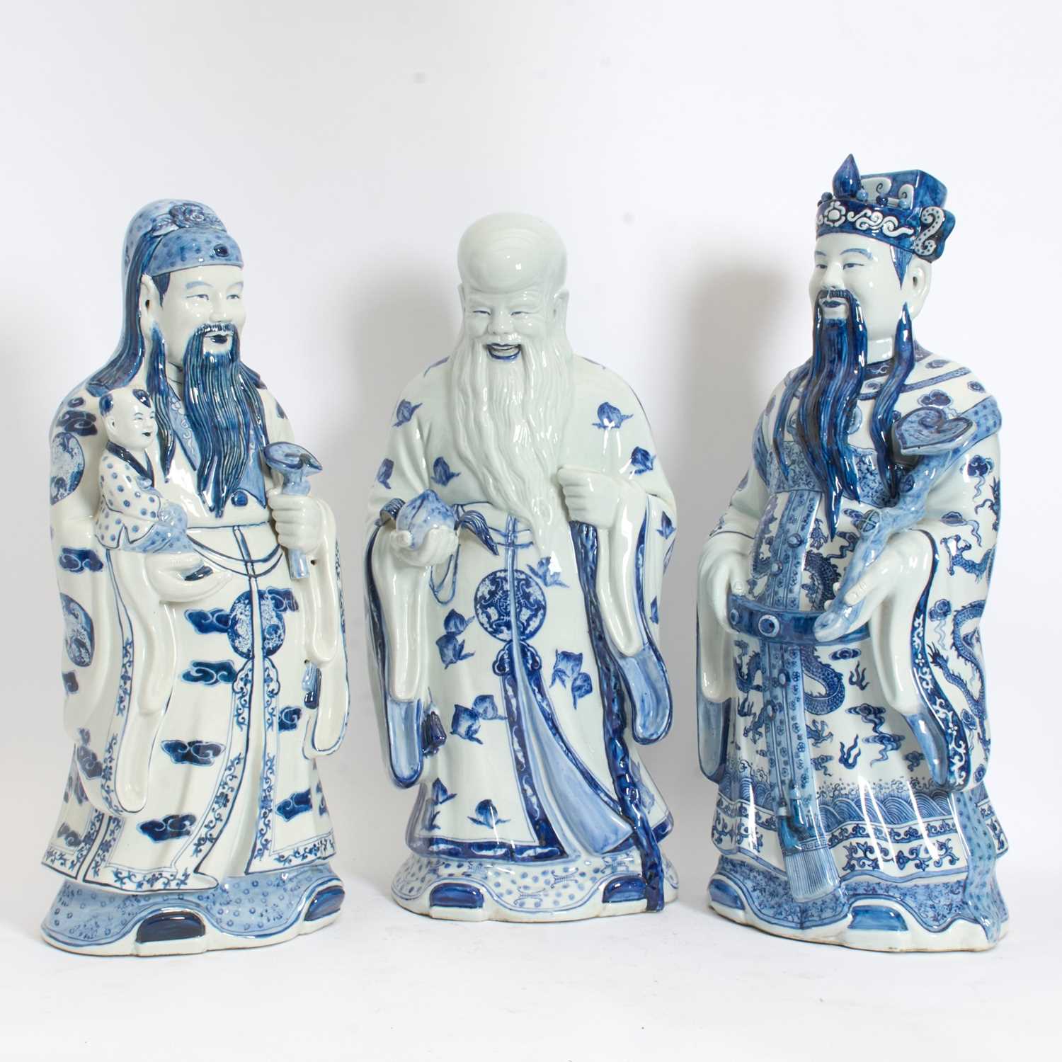 Lot 36 - Three Blue and White Ceramic Figures