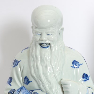 Lot 36 - Three Blue and White Ceramic Figures