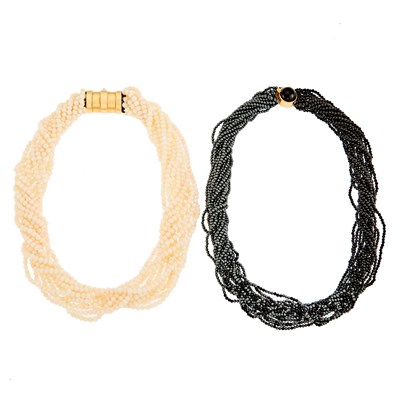 Lot 2252 - White Coral Torsade Necklace with Low Karat Gold Clasp and Hematite and Black Onyx Bead Torsade Necklace with Gold Clasp