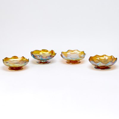 Lot 831 - Group of Four Similar Tiffany Gold Favrile Glass Low Footed Dishes