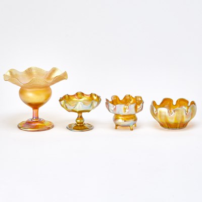 Lot 837 - Group of Four Tiffany Gold Favrile Glass Table Articles