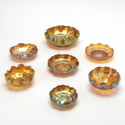 Lot 838 - Group of Seven Tiffany Gold Favrile Glass Small Bowls and Underplates