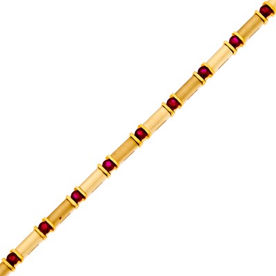 Lot 2047 - Two-Color Gold and Ruby Bracelet