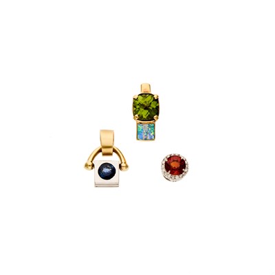 Lot 2270 - Three Gold, White Gold and Gem-Set Pendants
