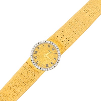 Lot 1152 - Piaget Two-Color Gold and Diamond Wristwatch