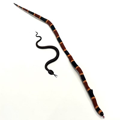Lot 197 - Two Snake Figures