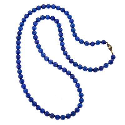 Lot 2036 - Buccellati Lapis Bead Necklace with Gold and Silver Clasp