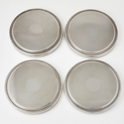 Lot 110 - Set of Four Christofle Silver-Plated "Malmaison" Pattern Trivets