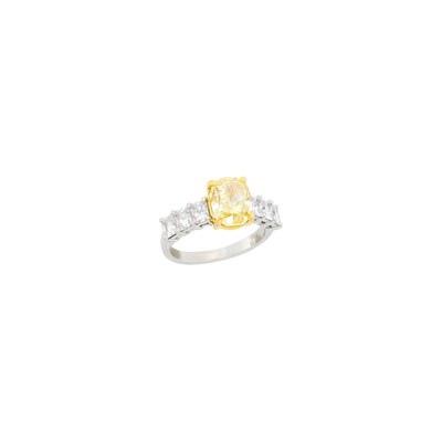 Lot 62 - Platinum, Gold, Fancy Yellow Diamond and Diamond Ring