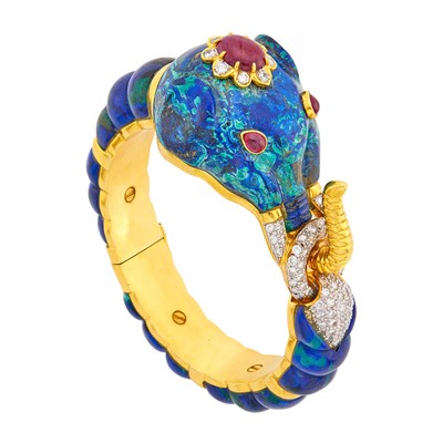 Lot 1140 - Gold, Carved Azurmalachite, Cabochon Ruby and Diamond Elephant Bangle Bracelet