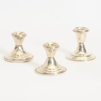 Lot 306 - Set of Three Weighted Silver Candle holders